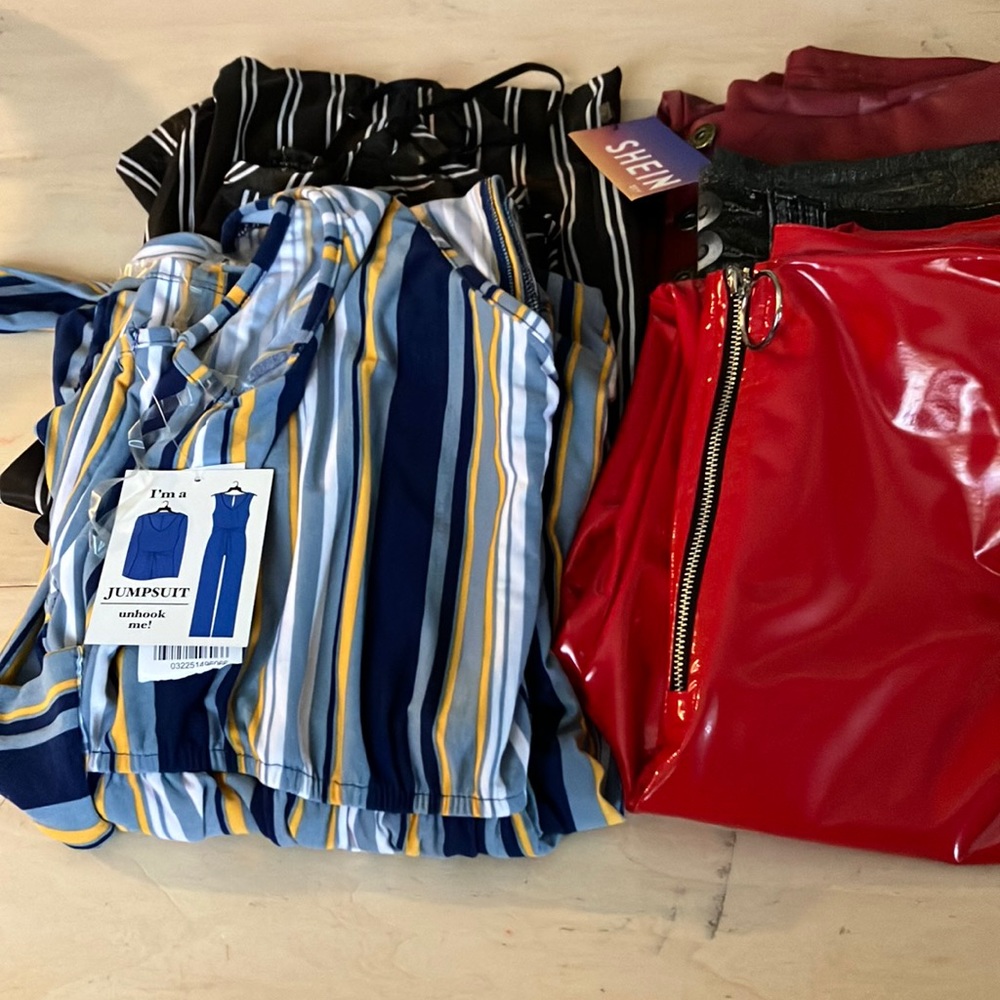 Two jumpers three pair pants, size medium